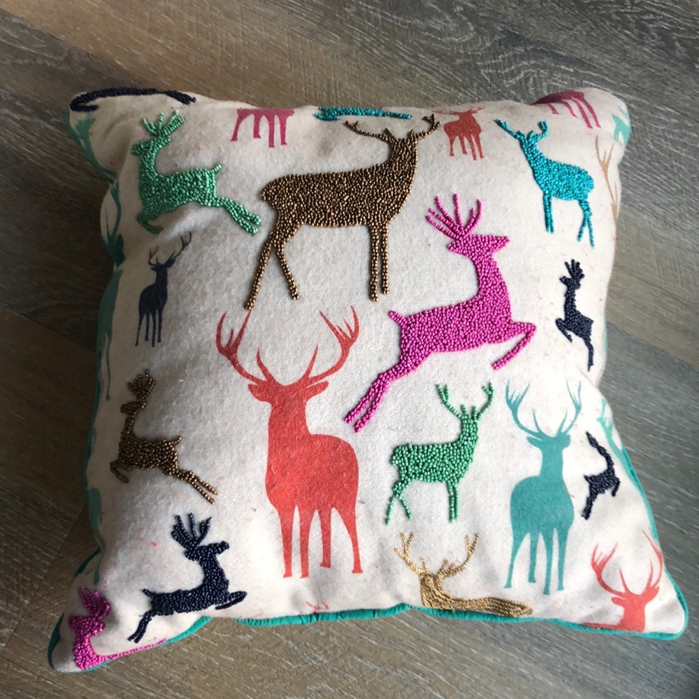 Reindeer multicolor throw pillows